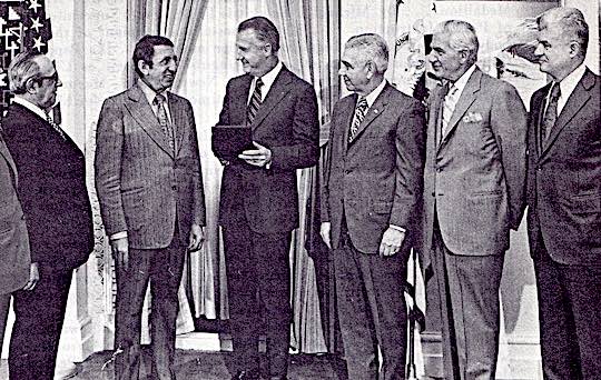 1972 - Vice President Spiro T. Agnew, member of Baltimore, Md. #30, receives an Ahepa solid gold medal commemorating the 150th anniversary of Greek Independence at a meeting in the Vice President's Office. (Left to right) Supreme Counsellor Dennis J. Livadas, Supreme Secretary William P. Tsaffaras, Supreme President Sam Nakis, the Vice President, Supreme Trustee Chairman Peter N. Derzis, Supreme Treasurer William G. Chirgotis, Executive Secretary George V. Leber.